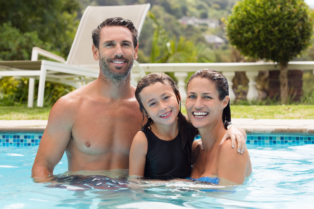 Family in Swimming Pool